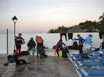 Divers getting ready to make a night dive prep. Photo by Greg